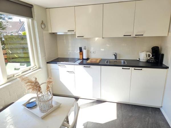 Bungalow Schotvanger Egmond aan den Hoef Esterno foto